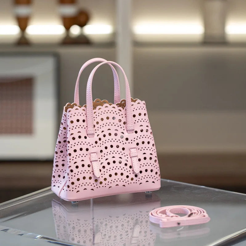 High-grade Hot Girl Hand-held Tote Bag Female 2025 New Niche Design Retro Versatile Shoulder Bag