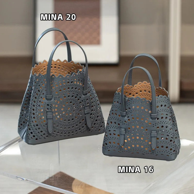 High-grade Hot Girl Hand-held Tote Bag Female 2025 New Niche Design Retro Versatile Shoulder Bag