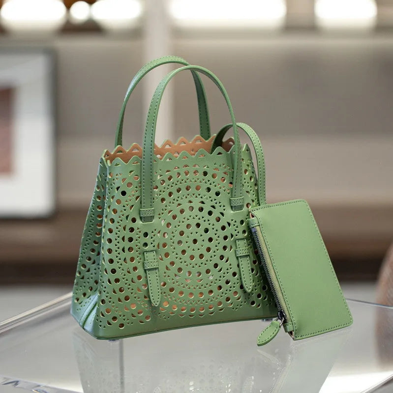 High-grade Hot Girl Hand-held Tote Bag Female 2025 New Niche Design Retro Versatile Shoulder Bag