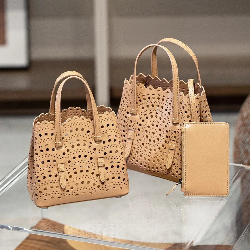 High-grade Hot Girl Hand-held Tote Bag Female 2025 New Niche Design Retro Versatile Shoulder Bag