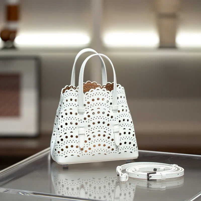 High-grade Hot Girl Hand-held Tote Bag Female 2025 New Niche Design Retro Versatile Shoulder Bag