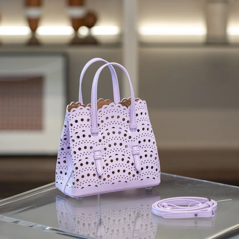 High-grade Hot Girl Hand-held Tote Bag Female 2025 New Niche Design Retro Versatile Shoulder Bag