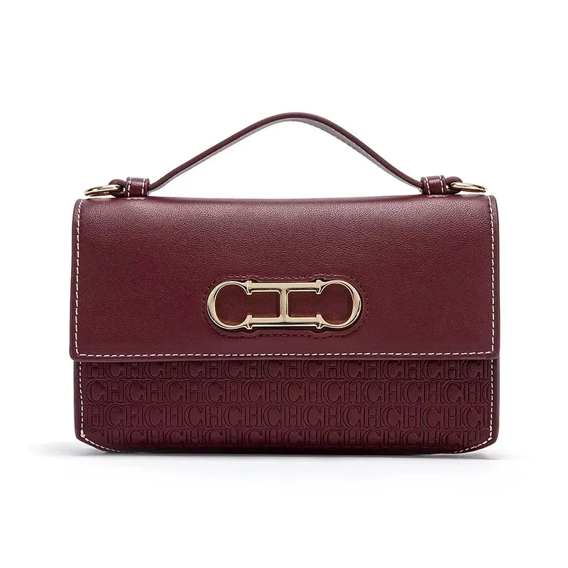 CH Premium Leather Handbag Monogram Embossing Metallic Clasp Portable Handle Structured Silhouette Ideal Office Evening Events