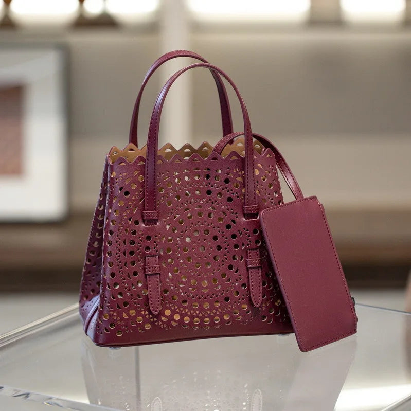 High-grade Hot Girl Hand-held Tote Bag Female 2025 New Niche Design Retro Versatile Shoulder Bag