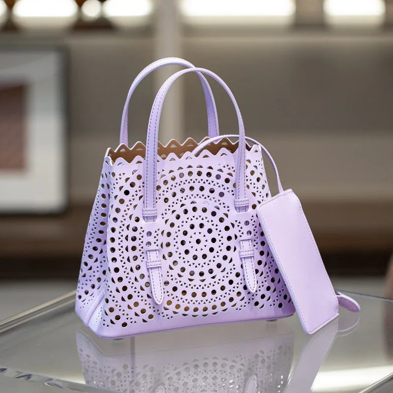 High-grade Hot Girl Hand-held Tote Bag Female 2025 New Niche Design Retro Versatile Shoulder Bag